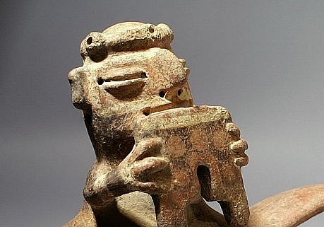 Peru, Vicus Double Chambered Whistling Vessel of a Figure Playing a Panpipe
This is the most published image of a whistling vessel from the early Vicus culture, but in actuality very few exist.
Media: Ceramic
Dimensions: Length: 11 1/2 in. x Height: 7 in.
$4,500
M2096