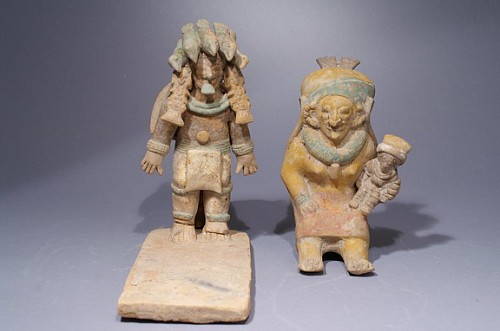 Ceramic: Jamacoaque Platform with priest and woman holding a small figure Price Upon Request