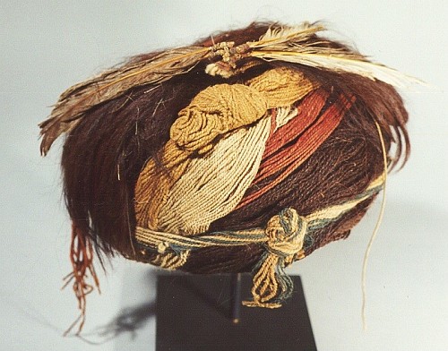 Chile - Cameronie turban with henna colored hair with upright fiber tassel $4,250