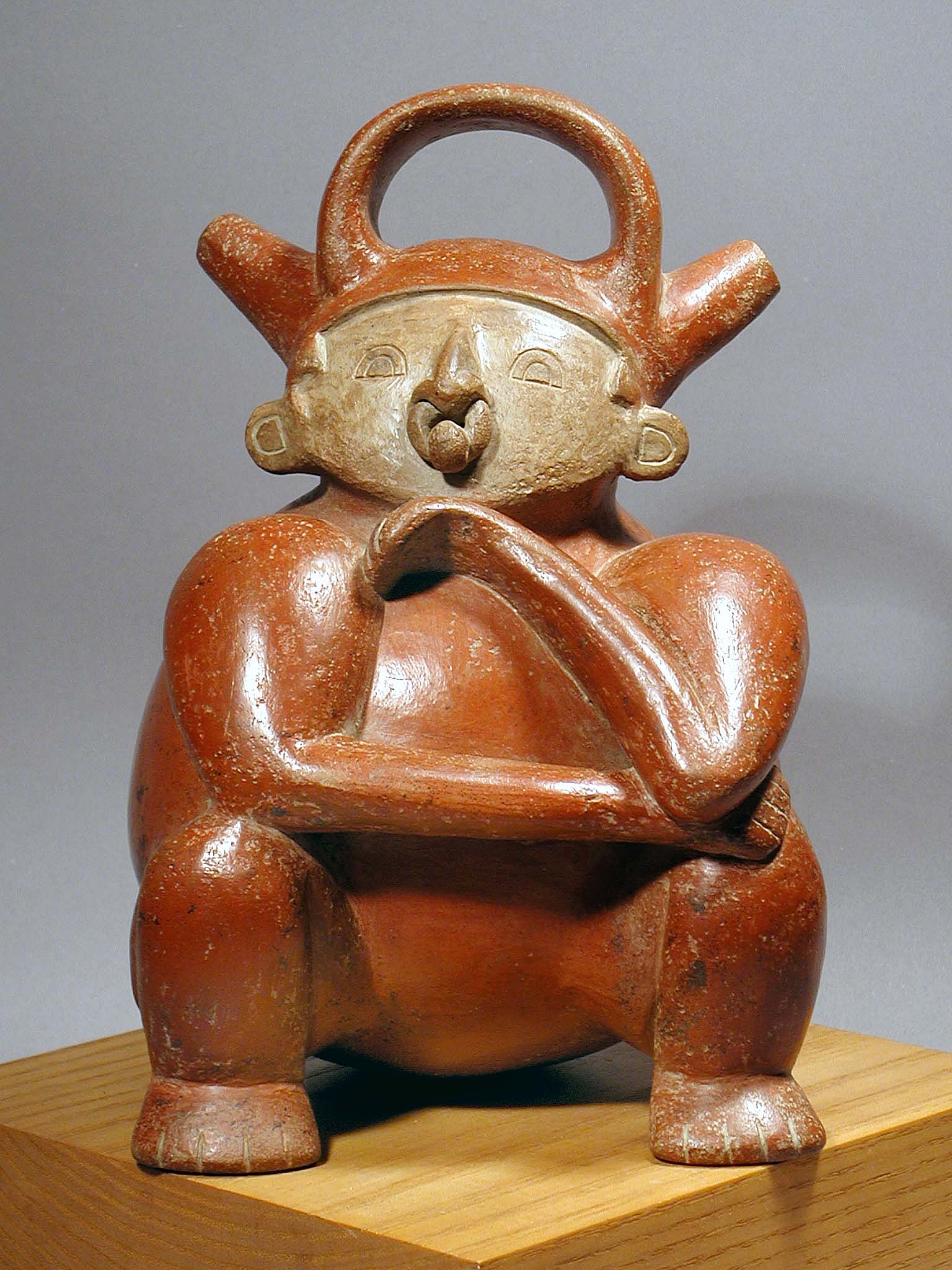 Colombia, Calima Alcarazza Effigy in the form of a Seated Shaman
A similar effigy is illustrated "Calima: Diez Mil Anos de Historia" by Schrimpff, Bray et. al. (1992: pl. 38).
Period: Colombia, Calima, Yotoco Phase, Cauca River Valley, circa AD100-1000
Media: Ceramic
Dimensions: Height  8 3/4"
Price Upon Request
M4015