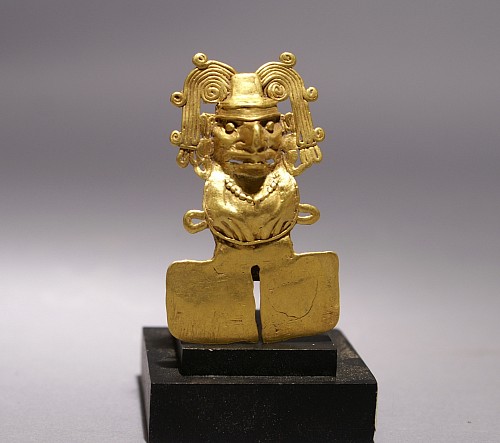 Mixtec Gold Figural Pendant of Xochipilli with ornate headdress. Price Upon Request