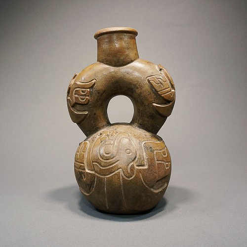 Chavin Cupisnique Style Stirrup spout Vessel Decorated with a Harpy Eagle. Price Upon Request