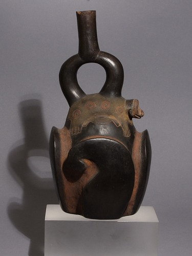 Ceramic: Chavin Tembladera Style Stirrup Spout Vessel Decorated with Sea Lion Deity $9,000