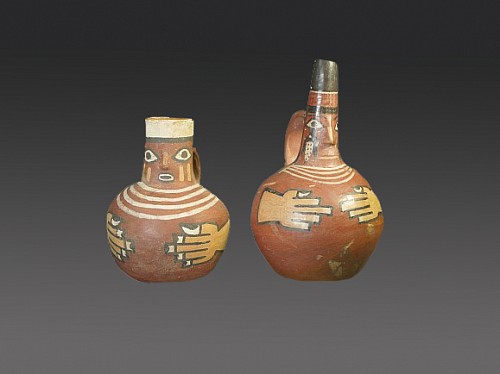 Peru - Two Wari Strap Handle Effigy Vessels with Faces on Spouts Price Upon Request
