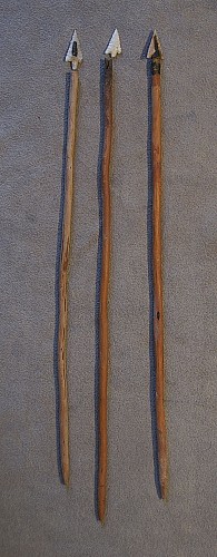 Three Arrows with Wood Shafts and Napped Quartz Points