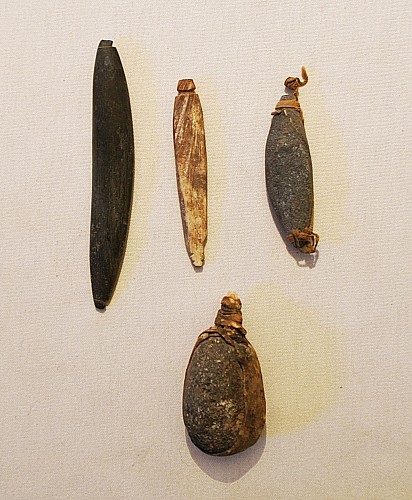 Exhibition: Fishing Methods and Implements of Ancient Chile, Work: Four Fishing Sinkers With Attachments