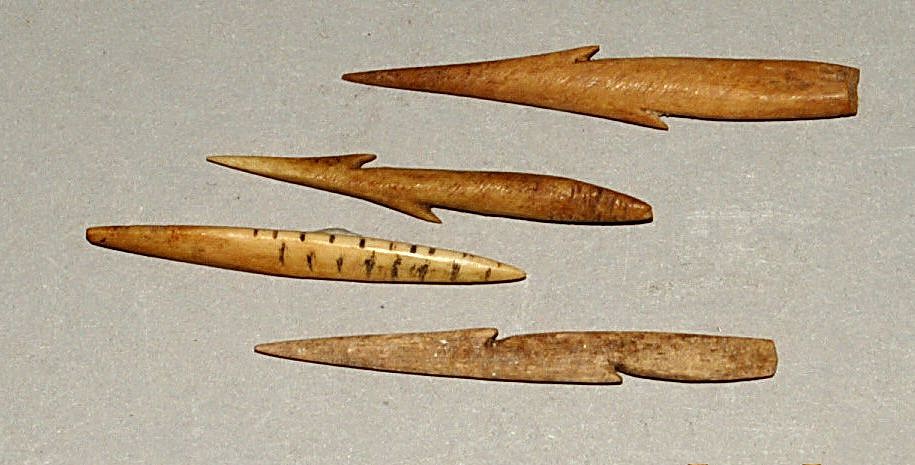 Chile, Three Carved Bone Barbs with Measuring Tool
These barbs were lashed to a cigar-shaped stone sinker.  The measuring tool was marked with lines and dots on the edge.   These markings allowed the maker to carve the spikes in the same place on each barb .
Media: Bone
Dimensions: Length: 2"
n6044
