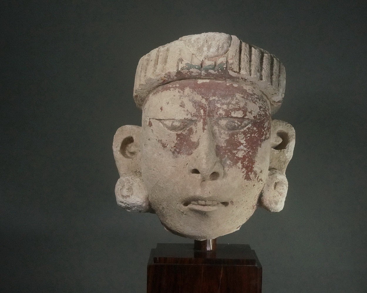 Mexico, Early Post-Classic Mayan Stucco Head Depicting a Priest
The priest’s eyes are looking down as if the head was placed high up on a wall.  
Ex. collection Hana Gallery, Tokyo, prior to 1970.
Media: Stone
Dimensions: Height: 10" x Width: 8 1/2"  Depth 7 1/2"
$27,000
n3045