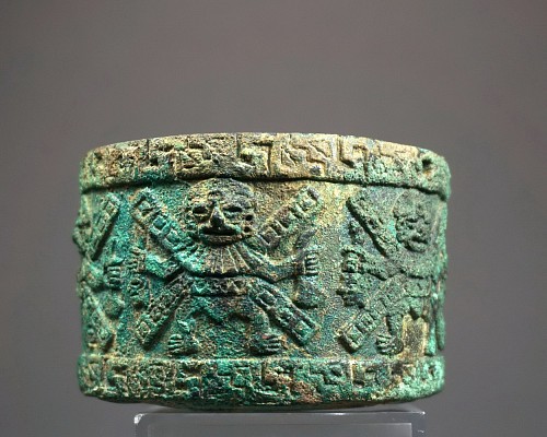 Peru - Moche Cylindrical Container with 6 Decapitators in High Relief $12,000