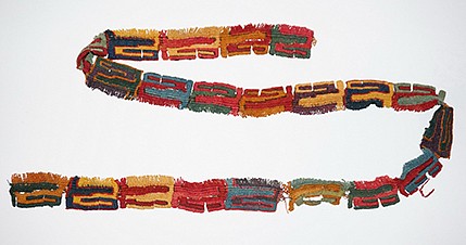 Peru, Knotted Textile Fringe with Colorful Abstract Motif
This knotted fringe is distinguished by its brilliant colors and abstract "z" motif repeated along the band.  It was not woven on a loom but instead was created by a method referred to as "tubular looping."  Looping is a single-element technique in which the free end and full length of the yarn are pulled through previous work at the edge of the fabric to form each new loop.  Looping predates the domestication of fiber-bearing plants and animals and the invention of weaving in the Americas and possibly Eurasia.  The choice of color combinations creates a vibrating impact.
Media: Textile
Dimensions: Length: 61 inches; Width: 2 inches
$3,000
91105