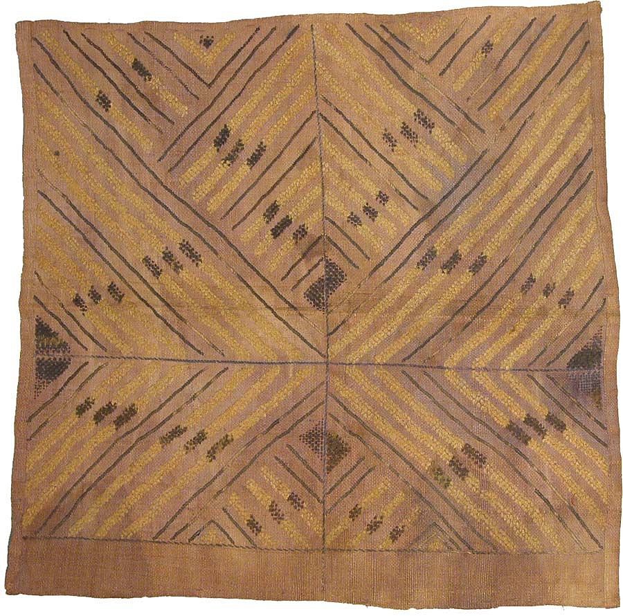 Zaire, Dekese (Kuba Kingdom) Raffia Panel with X-shaped Motif
Woven palm-leaf fiber panel embroidered with four variations on the same V-shaped motif which intersect to form a large “X.”  The panel was embroidery cut to form a pile surface, resembling velvet.  This panel was brought back by one of the members of H.M. Stanley's famous expedition to Central Africa in the late 1800's.
Media: Textile
Dimensions: Length  23.5" x Width 23.5"
$450
M4089
