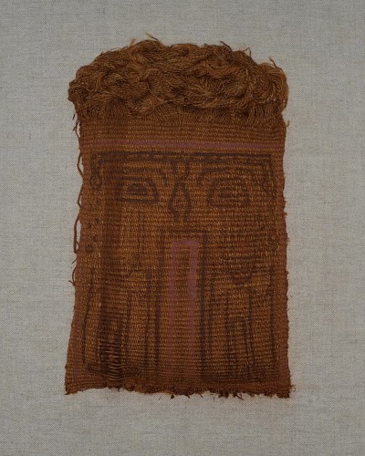 Exhibition: Paracas Exhibit, Work: Paracas Painted Cotton Mummy Mask Depicting a Face Doubling as a Temple Entrance $16,000