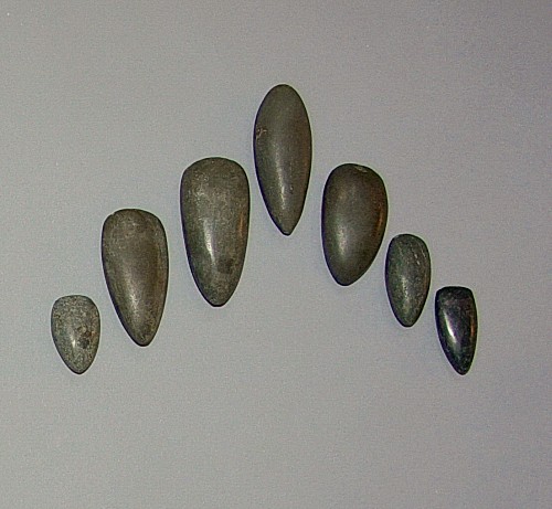 Seven Small Dark Greenstone Celts as Tools $1,500