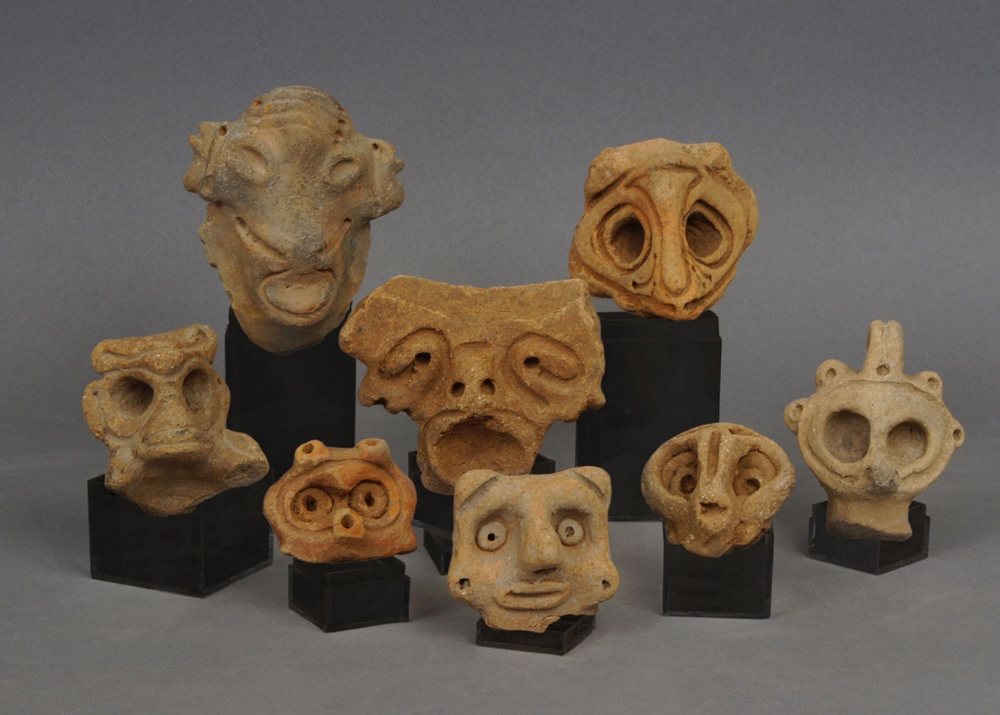 Dominican Republic, Set of 8 Taino Ceramic Anthropomorphic Faces
Referred to as “adornos,” these heads would have been used to adorn a ceremonial ceramic bowl. Each head refers to a specific animistic deity revered by the Taino culture.  This selection is unusual in that it shows atypical, expressive faces.  
Media: Ceramic
$1,200
99450