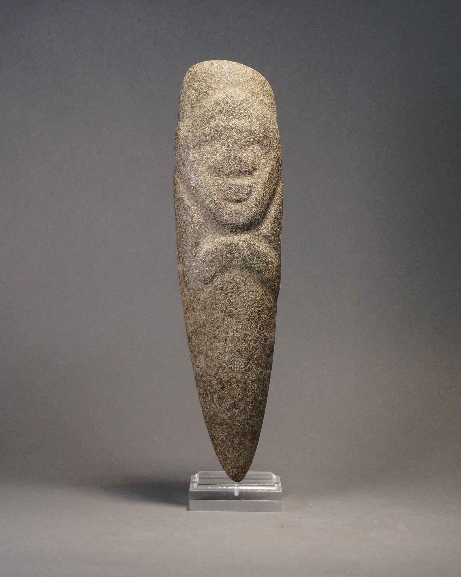 Dominican Republic, Large Taíno Celt Carved with a Face
This ceremonial celt features a deity face, cone-shaped headdress, and hands held to stomach. See Herrera, p. 140-144.^
Media: Stone
Dimensions: Length 12" x 3" (30cm x 8cm)
Price Upon Request
N1042