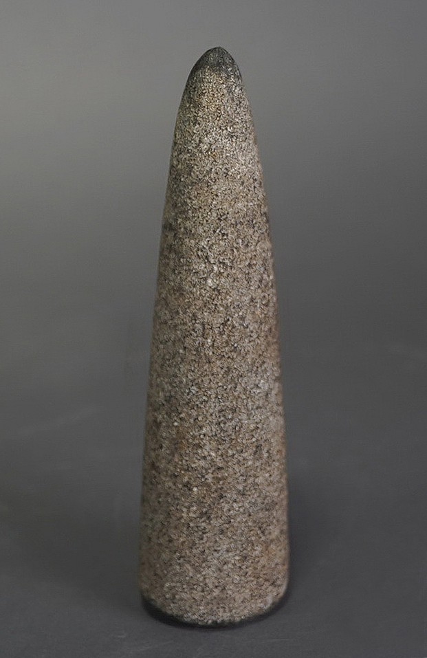 Dominican Republic, Taíno Conical Pestle of Speckled Stone
This is a classsic Taíno  pestle design, and this pestle may have been used to prepare cassava, other plant foods, or psychoactive compounds.  The bottom surface is smooth and covered with a dark slip.
Period: Dominican Republic, Courian Subseries, c. 2000 BC - AD 250
Media: Stone
Dimensions: Length: 5 1/4"
98131