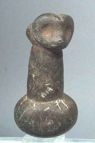 Work: Taíno Carved Dark Stone Pestle with Owl Deity