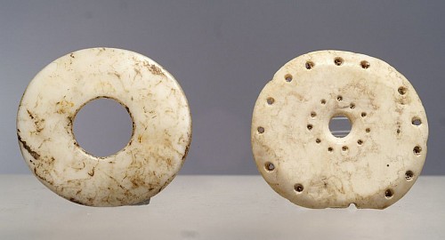 Work: Two Taíno  Carved Shell Discs that Could be Eyes for a Idol