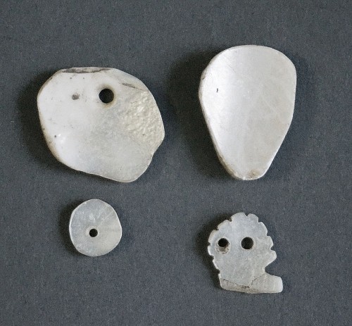 Four TaÃ­no  Carved Mother of Pearl Beads