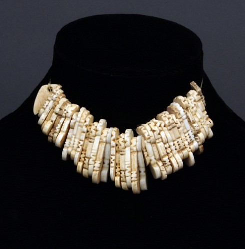 TaÃ­no Necklace of 40 Stylized Shell Key-Shaped Beads