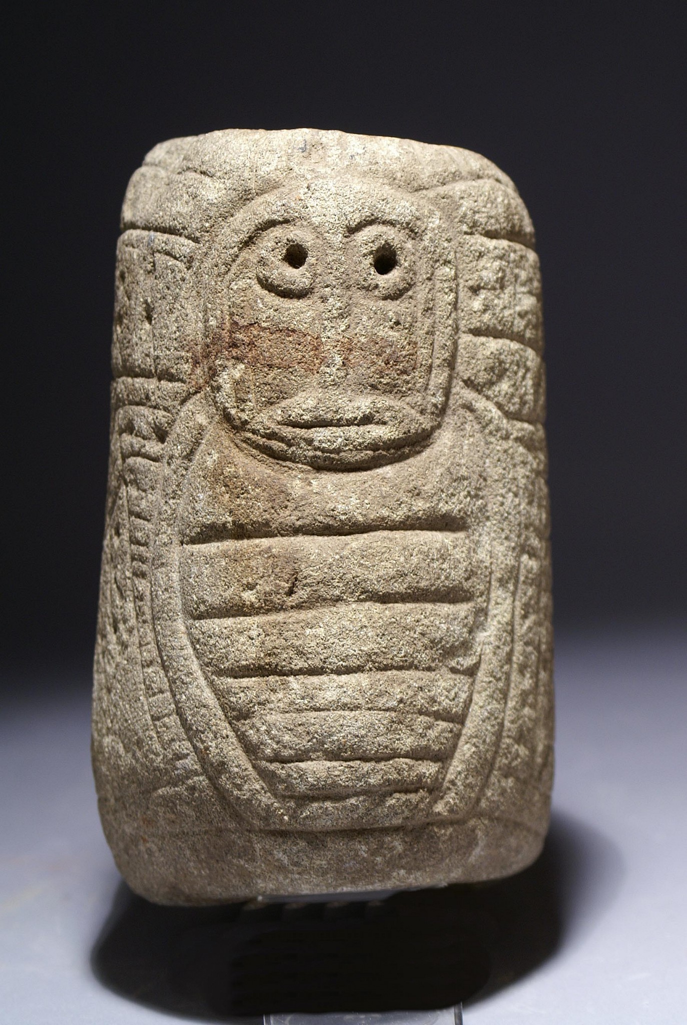 Dominican Republic, Taíno Stone Pillar Effigy with Incised Owls Front and Back
This stone effigy features abstracted owls carved on both the front and back. The owls have ribbed torsos and wings wrapped around the sides of the stone. Owls were considered spirits of the dead and were both feared and revered by the Taíno .
Period: Dominican Republic, Taíno , c. AD 1000 - 1500
Media: Stone
Dimensions: Height:  6 1/2" x Width: 5"
M3080