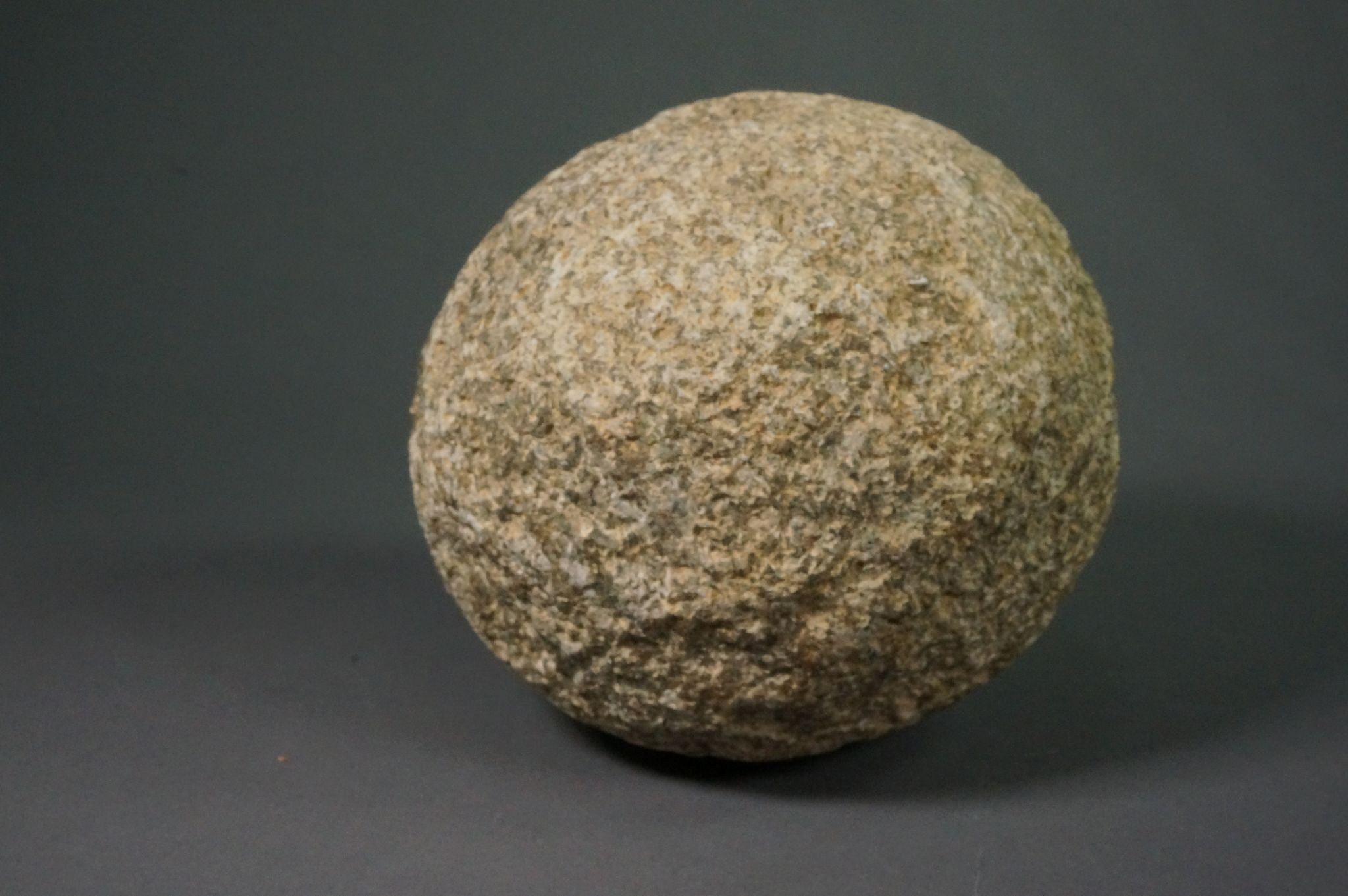 Dominican Republic, Pre--Taíno  Large Spherical Pounder of Coral
This is a particularly large sphere for pounding and just fits into a hand.  It is made of very hard coral.
Period: Dominican Republic, Courian Subseries, c. 2000 BC - AD 250
Media: Stone
Dimensions: Diameter: 4 1/4"
n7008