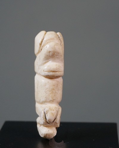 Work: Taíno  Shell Amulet of Elongated Crouching Figure with Large Phallus