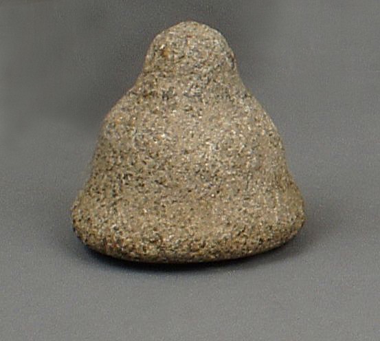 Dominican Republic, Pre-Taíno  Stone Graduated Grinder
This particular form is one of the rarer types for pounders, and this pounder fits nicely into the hand. The bottom face is smooth from use.
Period: Dominican Republic, Ostionoid, c. AD 200 - 900
Media: Stone
Dimensions: Height: 2 1/4" x " x Diameter: 2.5"
98238