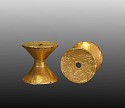 Colombia, Early Calima Pair of Gold Hour-Glass Shaped Ear Spools
Metal