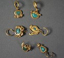 Ecuador, 7 La Tolita Gold with Platinum Miniature Ear Ornaments with Turquoise Inlays
Metal