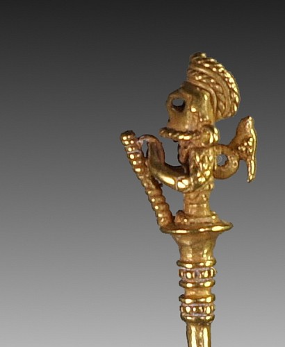 Calima Cast Gold Lime Dipper of a Warrior with Animal Perched on Back $12,000
